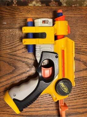 Nerf Yellow and Orange Foam Dart Pistol with Black and Gray Grip